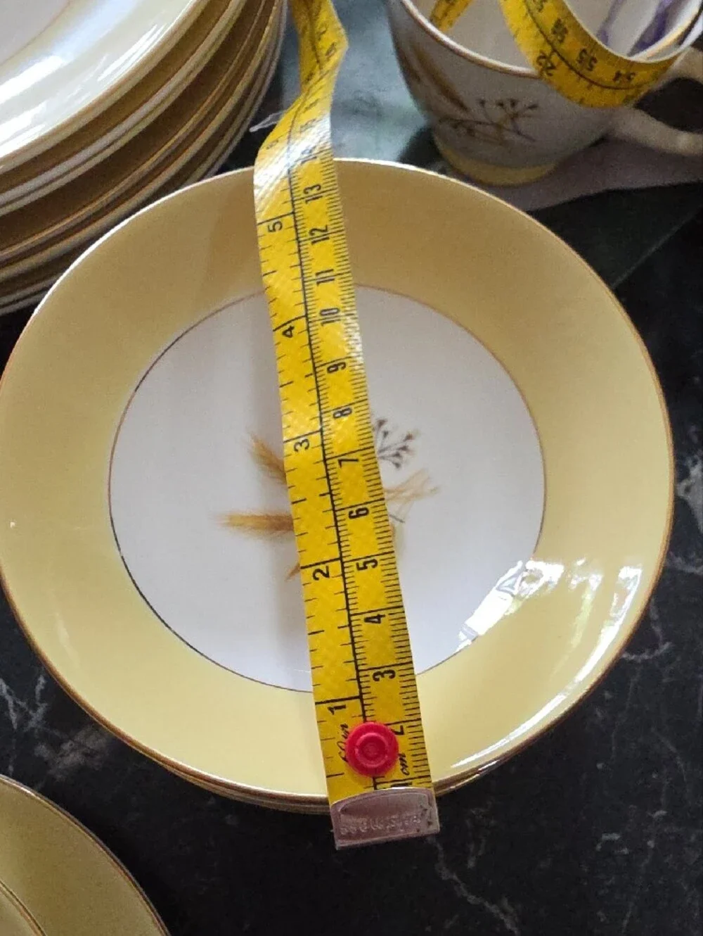Yellow and White Floral Dinnerware with Gold Trim Accents